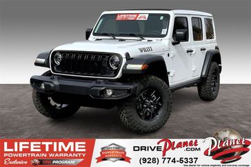 2024 Jeep Wrangler 4-door Willys in a Bright White Clear Coat exterior color. Planet Chrysler Dodge Jeep Ram FIAT of Flagstaff (928) 569-5797 planetchryslerdodgejeepram.com 
