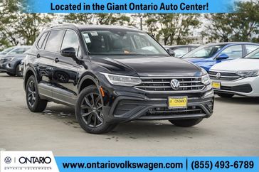 2024 Volkswagen Tiguan 2.0T SE in a Deep Black Pearl Metallic exterior color and Titan Blackinterior. Ontario Auto Center ontarioautocenter.com 