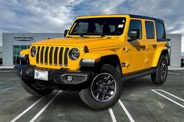 2021 Jeep Wrangler Unlimited  in a Hellayella Clear Coat exterior color and Blackinterior. Crystal Chrysler Jeep Dodge Ram (760) 507-2975 pixelmotiondemo.com 