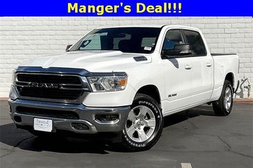 2021 RAM 1500 Big Horn Lone Star in a Bright White Clear Coat exterior color and Blackinterior. Crystal Chrysler Jeep Dodge Ram (760) 507-2975 pixelmotiondemo.com 
