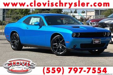 2023 Dodge Challenger SXT in a B5 Blue exterior color and Blackinterior. Clovis Chrysler Dodge Jeep RAM 559-314-1399 clovischryslerdodgejeepram.com 