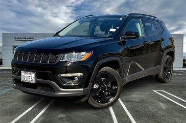 2021 Jeep Compass Altitude in a Diamond Black Crystal Pearl Coat exterior color and Blackinterior. Crystal Chrysler Jeep Dodge Ram (760) 507-2975 pixelmotiondemo.com 