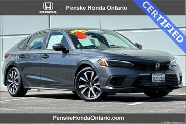 2024 Honda Civic EX-L in a Meteorite Gray Metallic exterior color and Blackinterior. Ontario Auto Center ontarioautocenter.com 