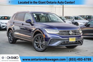 2024 Volkswagen Tiguan 2.0T SE in a Atlantic Blue Metallic exterior color and Storm Grayinterior. Ontario Auto Center ontarioautocenter.com 