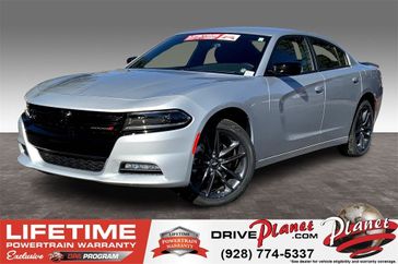 2023 Dodge Charger SXT Awd in a Triple Nickel exterior color and Blackinterior. Planet Chrysler Dodge Jeep Ram FIAT of Flagstaff (928) 569-5797 planetchryslerdodgejeepram.com 