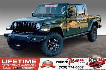 2023 Jeep Gladiator Willys 4x4 in a Sarge Green Clear Coat exterior color and Blackinterior. Planet Chrysler Dodge Jeep Ram FIAT of Flagstaff (928) 569-5797 planetchryslerdodgejeepram.com 