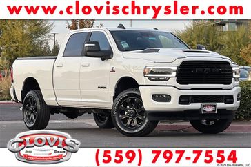 2024 RAM 2500 Laramie Crew Cab 4x4 6'4' Box in a Pearl White exterior color and Blackinterior. Clovis Chrysler Dodge Jeep RAM 559-314-1399 clovischryslerdodgejeepram.com 