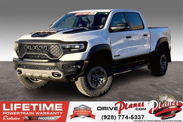 2024 RAM 1500 Trx Crew Cab 4x4 5'7' Box in a Bright White Clear Coat exterior color and Blackinterior. Planet Chrysler Dodge Jeep Ram FIAT of Flagstaff (928) 569-5797 planetchryslerdodgejeepram.com 