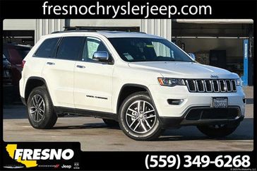 2020 Jeep Grand Cherokee Limited in a Bright White Clear Coat exterior color and Blackinterior. Fresno Chrysler Dodge Jeep RAM 559-206-5254 fresnochryslerjeep.com 