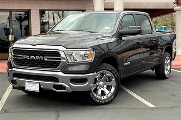 2024 RAM 1500 Big Horn Crew Cab 4x2 5'7' Box in a Granite Crystal Metallic Clear Coat exterior color. Crystal Chrysler Jeep Dodge Ram (760) 507-2975 pixelmotiondemo.com 
