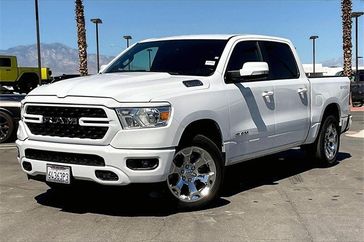2022 RAM 1500 Big Horn Lone Star in a Bright White Clear Coat exterior color and Blackinterior. I-10 Chrysler Dodge Jeep Ram (760) 565-5160 pixelmotiondemo.com 
