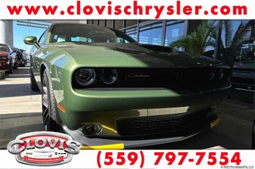 2023 Dodge Challenger R/T Scat Pack in a F8 Green exterior color and Blackinterior. Clovis Chrysler Dodge Jeep RAM 559-314-1399 clovischryslerdodgejeepram.com 
