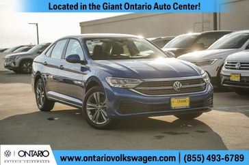 2024 Volkswagen Jetta 1.5T SE in a Rising Blue Metallic exterior color and Titan Blackinterior. Ontario Auto Center ontarioautocenter.com 