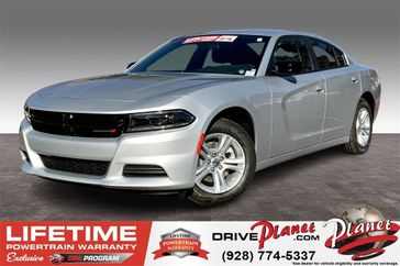 2023 Dodge Charger SXT Rwd in a Triple Nickel exterior color and Blackinterior. Planet Chrysler Dodge Jeep Ram FIAT of Flagstaff (928) 569-5797 planetchryslerdodgejeepram.com 