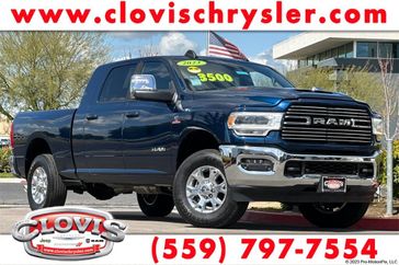 2023 RAM 3500 Laramie Mega Cab 4x4 6'4' Box in a Patriot Blue Pearl Coat exterior color and Blackinterior. Clovis Chrysler Dodge Jeep RAM 559-314-1399 clovischryslerdodgejeepram.com 