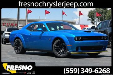 2023 Dodge Challenger R/T Scat Pack Widebody in a B5 Blue exterior color and Blackinterior. Fresno Chrysler Dodge Jeep RAM 559-206-5254 fresnochryslerjeep.com 
