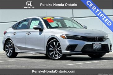 2024 Honda Civic EX-L in a Lunar Silver Metallic exterior color and Blackinterior. Ontario Auto Center ontarioautocenter.com 