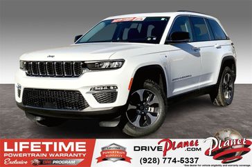 2024 Jeep Grand Cherokee 4xe in a Bright White Clear Coat exterior color and Global Blackinterior. Planet Chrysler Dodge Jeep Ram FIAT of Flagstaff (928) 569-5797 planetchryslerdodgejeepram.com 
