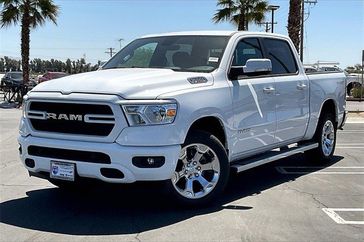2022 RAM 1500 Big Horn Crew Cab 4x2 5'7' Box in a Bright White Clear Coat exterior color and Blackinterior. I-10 Chrysler Dodge Jeep Ram (760) 565-5160 pixelmotiondemo.com 