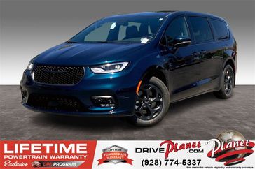 2023 Chrysler Pacifica Plug-in Hybrid Touring L in a Fathom Blue Pearl Coat exterior color and Blackinterior. Planet Chrysler Dodge Jeep Ram FIAT of Flagstaff (928) 569-5797 planetchryslerdodgejeepram.com 
