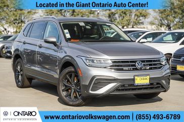 2024 Volkswagen Tiguan 2.0T SE in a Pyrite Silver Metallic exterior color and Titan Blackinterior. Ontario Auto Center ontarioautocenter.com 