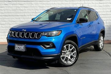 2022 Jeep Compass Latitude Lux in a Laser Blue Pearl Coat exterior color and Blackinterior. I-10 Chrysler Dodge Jeep Ram (760) 565-5160 pixelmotiondemo.com 