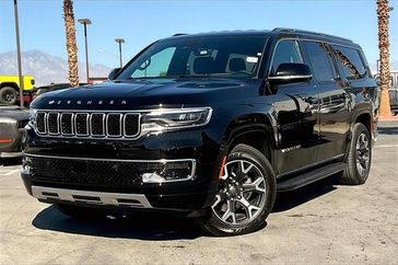 2023 Wagoneer L Series III 4X4 in a Diamond Black Crystal Pearl Coat exterior color and Global Blk Lth Trm Bkt Stinterior. I-10 Chrysler Dodge Jeep Ram (760) 565-5160 pixelmotiondemo.com 