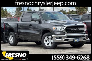 2024 RAM 1500 Big Horn Crew Cab 4x4 5'7' Box in a Granite Crystal Metallic Clear Coat exterior color and Blackinterior. Fresno Chrysler Dodge Jeep RAM 559-206-5254 fresnochryslerjeep.com 