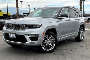 2023 Jeep Grand Cherokee Summit 4xe in a Silver Zynith exterior color and Tupelo/Blkinterior. I-10 Chrysler Dodge Jeep Ram (760) 565-5160 pixelmotiondemo.com 