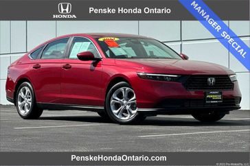 2024 Honda Accord LX in a Radiant Red Metallic exterior color and Grayinterior. Ontario Auto Center ontarioautocenter.com 