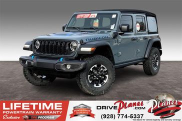 2024 Jeep Wrangler 4-door Rubicon 4xe in a Anvil Clear Coat exterior color and Blackinterior. Planet Chrysler Dodge Jeep Ram FIAT of Flagstaff (928) 569-5797 planetchryslerdodgejeepram.com 