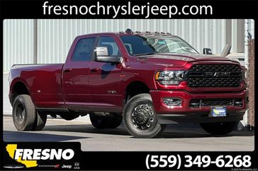 2024 RAM 3500 Big Horn Crew Cab 4x4 8' Box in a Delmonico Red Pearl Coat exterior color. Fresno Chrysler Dodge Jeep RAM 559-206-5254 fresnochryslerjeep.com 