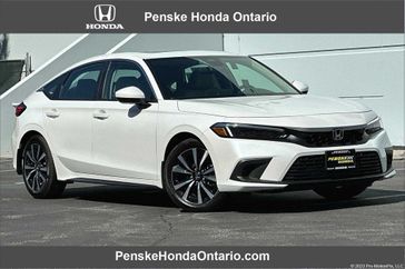 2024 Honda Civic EX-L in a Platinum White Pearl exterior color and Grayinterior. Ontario Auto Center ontarioautocenter.com 