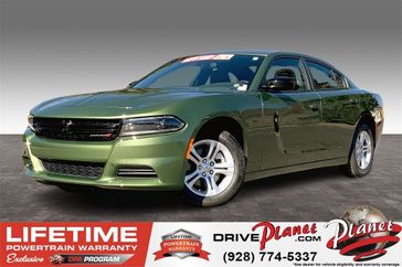2023 Dodge Charger SXT Rwd in a F8 Green exterior color and Blackinterior. Planet Chrysler Dodge Jeep Ram FIAT of Flagstaff (928) 569-5797 planetchryslerdodgejeepram.com 