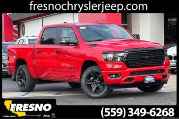 2024 RAM 1500 Big Horn Crew Cab 4x4 5'7' Box in a Flame Red Clear Coat exterior color and Blackinterior. Fresno Chrysler Dodge Jeep RAM 559-206-5254 fresnochryslerjeep.com 