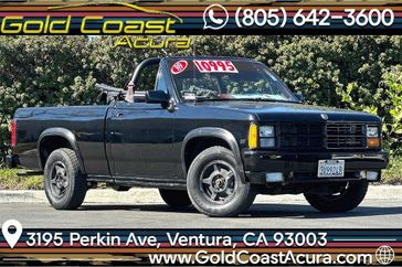 1989 Dodge Dakota Sport in a Black exterior color and Redinterior. Ventura Auto Center 866-978-2178 venturaautocenter.com 