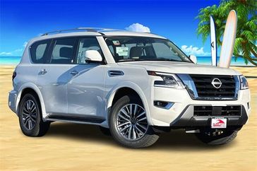 2024 Nissan Armada SL in a Aspen White Tri Coat exterior color and Almondinterior. BEACH BLVD OF CARS beachblvdofcars.com 