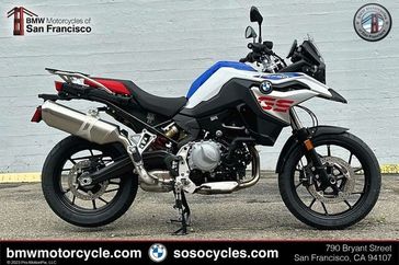 2023 BMW F 750 GS in a LT WHT/RC BLUE/RC RED exterior color. SoSo Cycles 877-344-5251 sosocycles.com 