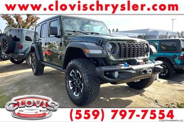 2024 Jeep Wrangler 4-door Rubicon 4xe in a Sarge Green Clear Coat exterior color and Blackinterior. Clovis Chrysler Dodge Jeep RAM 559-314-1399 clovischryslerdodgejeepram.com 