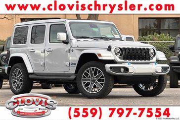 2024 Jeep Wrangler 4-door High Altitude 4xe in a Silver Zynith Clear Coat exterior color and Blackinterior. Clovis Chrysler Dodge Jeep RAM 559-314-1399 clovischryslerdodgejeepram.com 