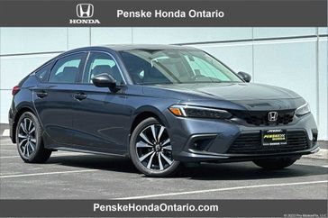2024 Honda Civic EX-L in a Meteorite Gray Metallic exterior color and Grayinterior. Ontario Auto Center ontarioautocenter.com 