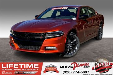 2023 Dodge Charger SXT Awd in a Sinamon Stick exterior color and Blackinterior. Planet Chrysler Dodge Jeep Ram FIAT of Flagstaff (928) 569-5797 planetchryslerdodgejeepram.com 