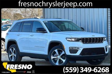 2022 Jeep Grand Cherokee 4xe in a Bright White Clear Coat exterior color and Global Blackinterior. Fresno Chrysler Dodge Jeep RAM 559-206-5254 fresnochryslerjeep.com 