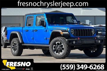 2024 Jeep Gladiator Rubicon 4x4 in a Hydro Blue Pearl Coat exterior color. Fresno Chrysler Dodge Jeep RAM 559-206-5254 fresnochryslerjeep.com 