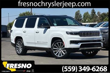 2023 Grand Wagoneer 4X4 in a Bright White Clear Coat exterior color. Fresno Chrysler Dodge Jeep RAM 559-206-5254 fresnochryslerjeep.com 