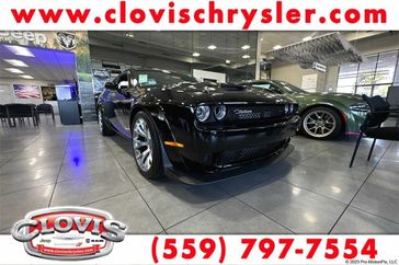 2023 Dodge Challenger Black Ghost in a Pitch Black Clear Coat exterior color. Clovis Chrysler Dodge Jeep RAM 559-314-1399 clovischryslerdodgejeepram.com 