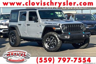 2024 Jeep Wrangler 4-door Rubicon 4xe in a Silver Zynith Clear Coat exterior color. Clovis Chrysler Dodge Jeep RAM 559-314-1399 clovischryslerdodgejeepram.com 