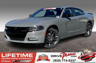 2023 Dodge Charger SXT Awd in a Destroyer Gray exterior color and Blackinterior. Planet Chrysler Dodge Jeep Ram FIAT of Flagstaff (928) 569-5797 planetchryslerdodgejeepram.com 