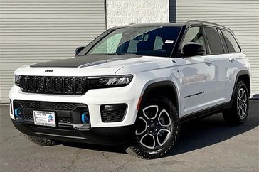 2024 Jeep Grand Cherokee Trailhawk 4xe in a Bright White Clear Coat exterior color and Global Blackinterior. I-10 Chrysler Dodge Jeep Ram (760) 565-5160 pixelmotiondemo.com 