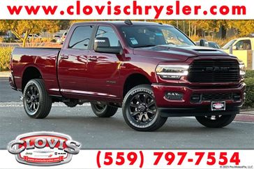 2024 RAM 2500 Laramie Crew Cab 4x4 6'4' Box in a Delmonico Red Pearl Coat exterior color and Blackinterior. Clovis Chrysler Dodge Jeep RAM 559-314-1399 clovischryslerdodgejeepram.com 